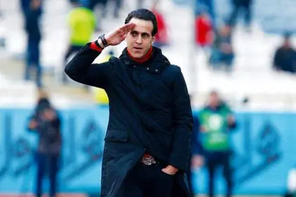Report by Ham Mihan Newspaper on the Reason for Ali Karimi's Invitation