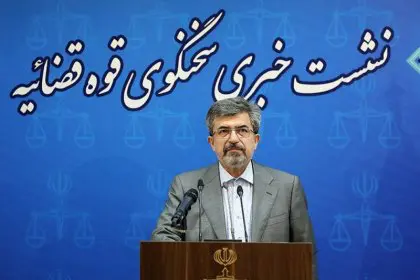 Massoud Setayeshi, the spokesperson for the Judiciary, states that the charges against Elham Afkari are conspiracy and collusion with the intent to act against national security. She is in prison.