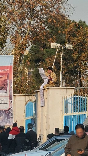 A Soldier's Protest with a Noose Around His Neck at Ghasr Intersection, Tehran, December 20