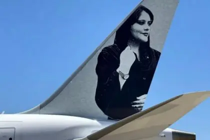 Plane Carrying Aid for Gaza Forced to Remove Image of Mahsa Amini