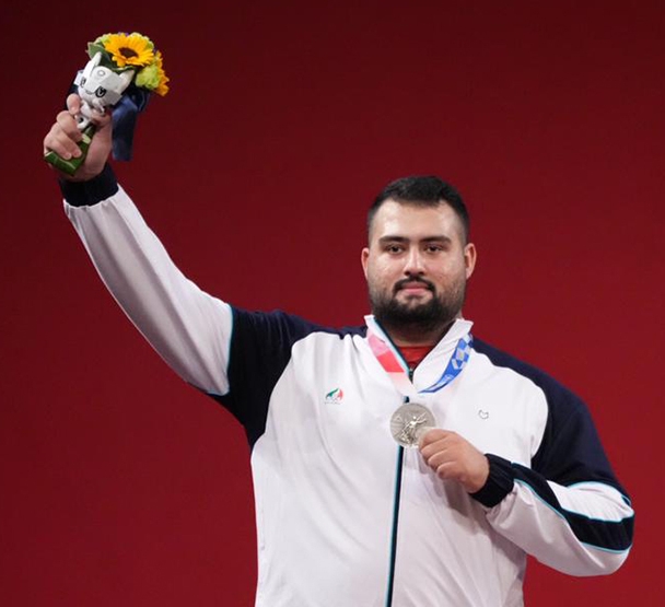 Ali Davoudi, Iranian weightlifter, reached the runner-up position and secured his quota for the Olympics