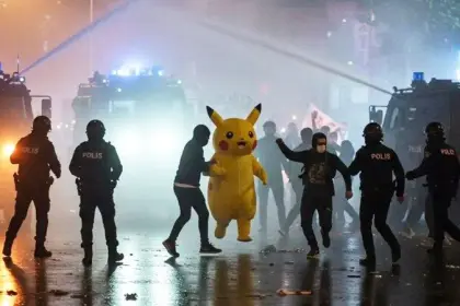 A Protester Escapes in Turkish Demonstrations Dressed as Cartoon Character Pikachu