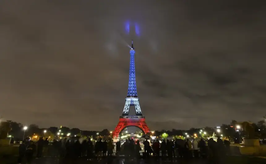 Eiffel Tower Illuminated in French Flag Colors on Anniversary of ISIS Attacks in Paris