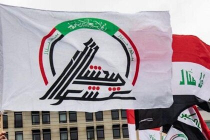 Controversy in Baghdad as Iraqi Forces Walk Over the American Flag, Angering a Congressman